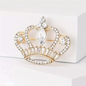 Gold-tone crown brooch with clear crystal-style accents
